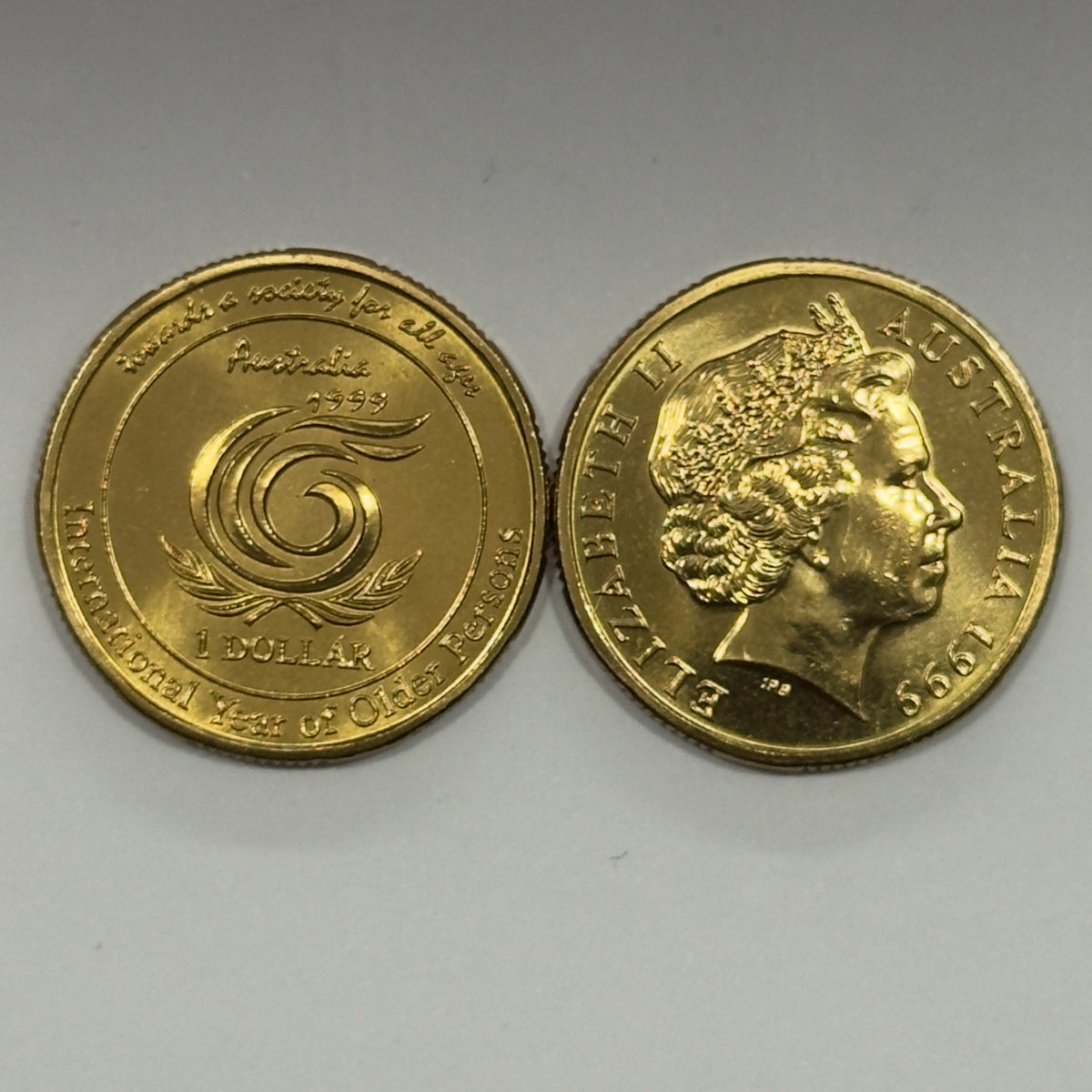 1999 $1 Coin - Year of the Older Person - Choice Uncirculated - comes in 2x2