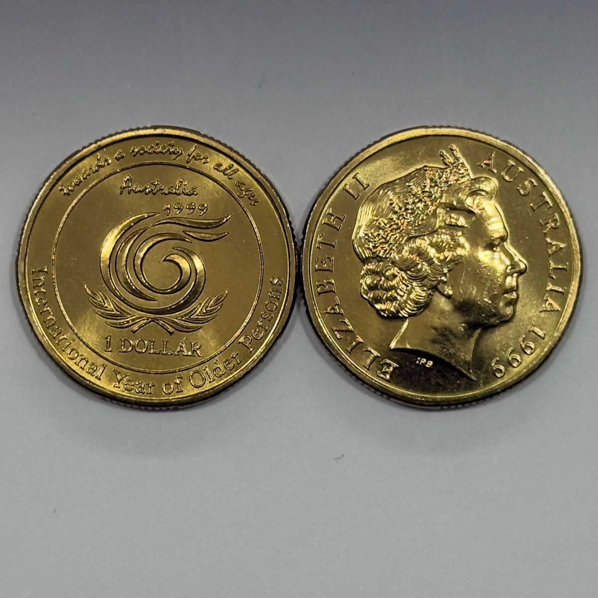 1999 $1 Coin - Year of the Older Person - Choice Uncirculated - comes in 2x2