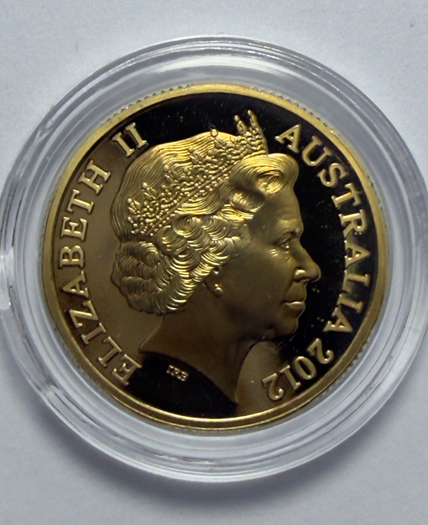2012 $1 Proof Coin - Mob Of Roos $1 - in Lighthouse Capsule