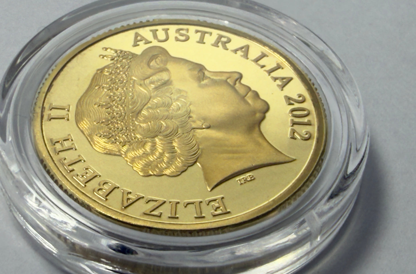 2012 $1 Proof Coin - Mob Of Roos $1 - in Lighthouse Capsule