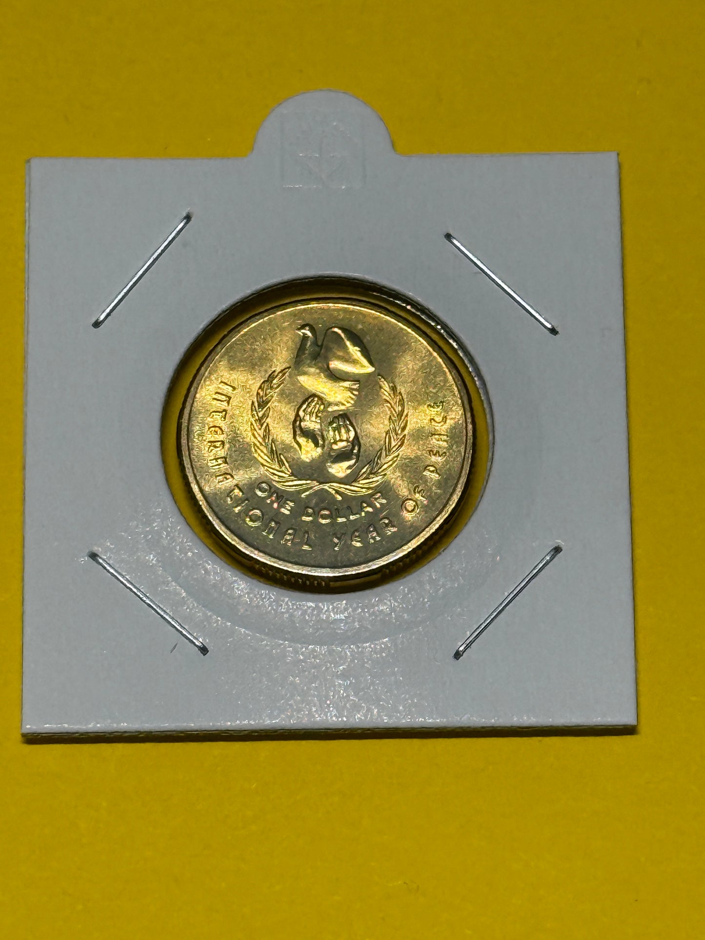 1986 $1 Coin - Year of Peace - Uncirculated - comes in 2x2 - New Age Numismatics