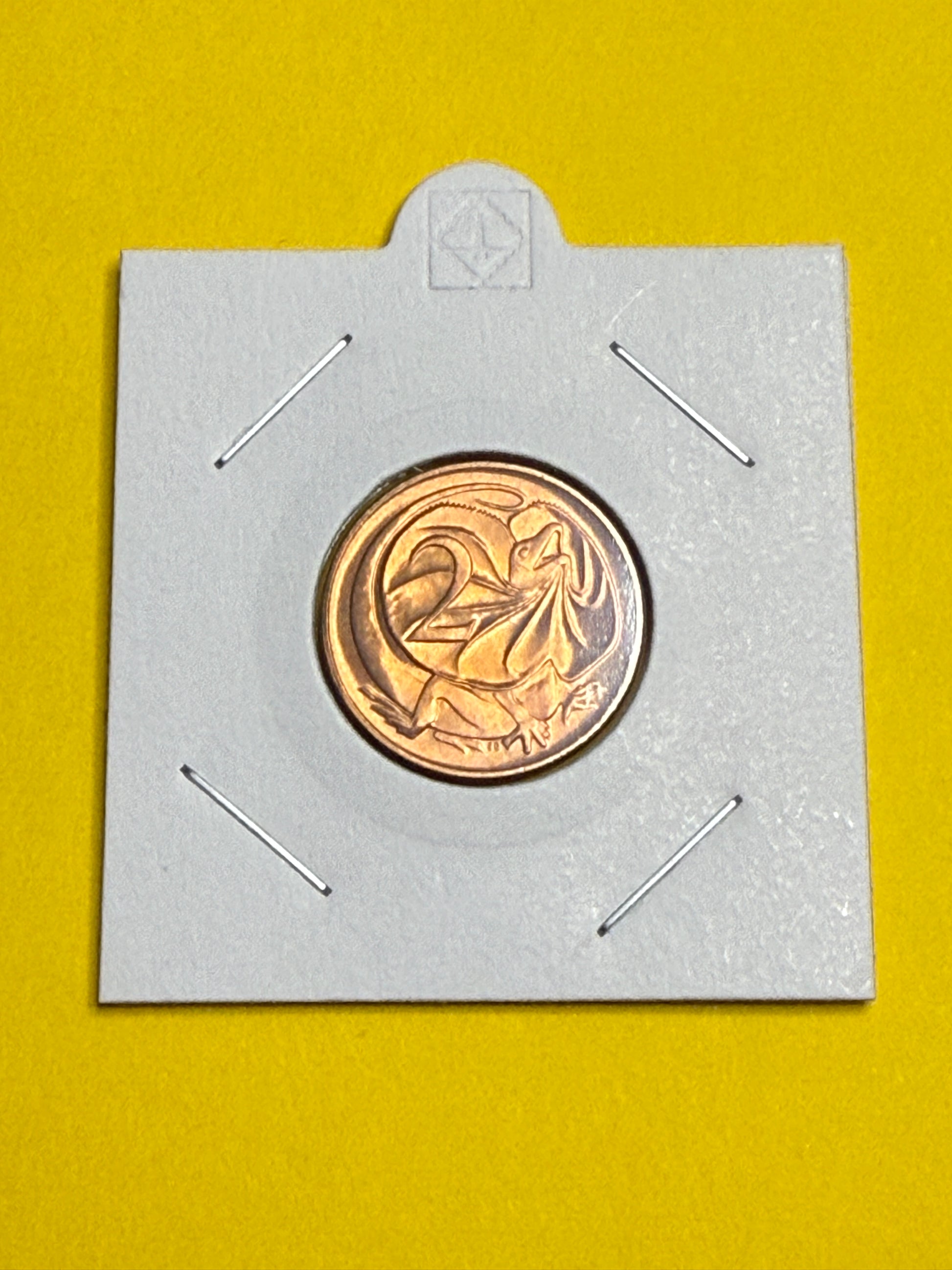 1977 2 Cent Coin - Uncirculated - Two Cent Coin - comes in 2x2 - New Age Numismatics