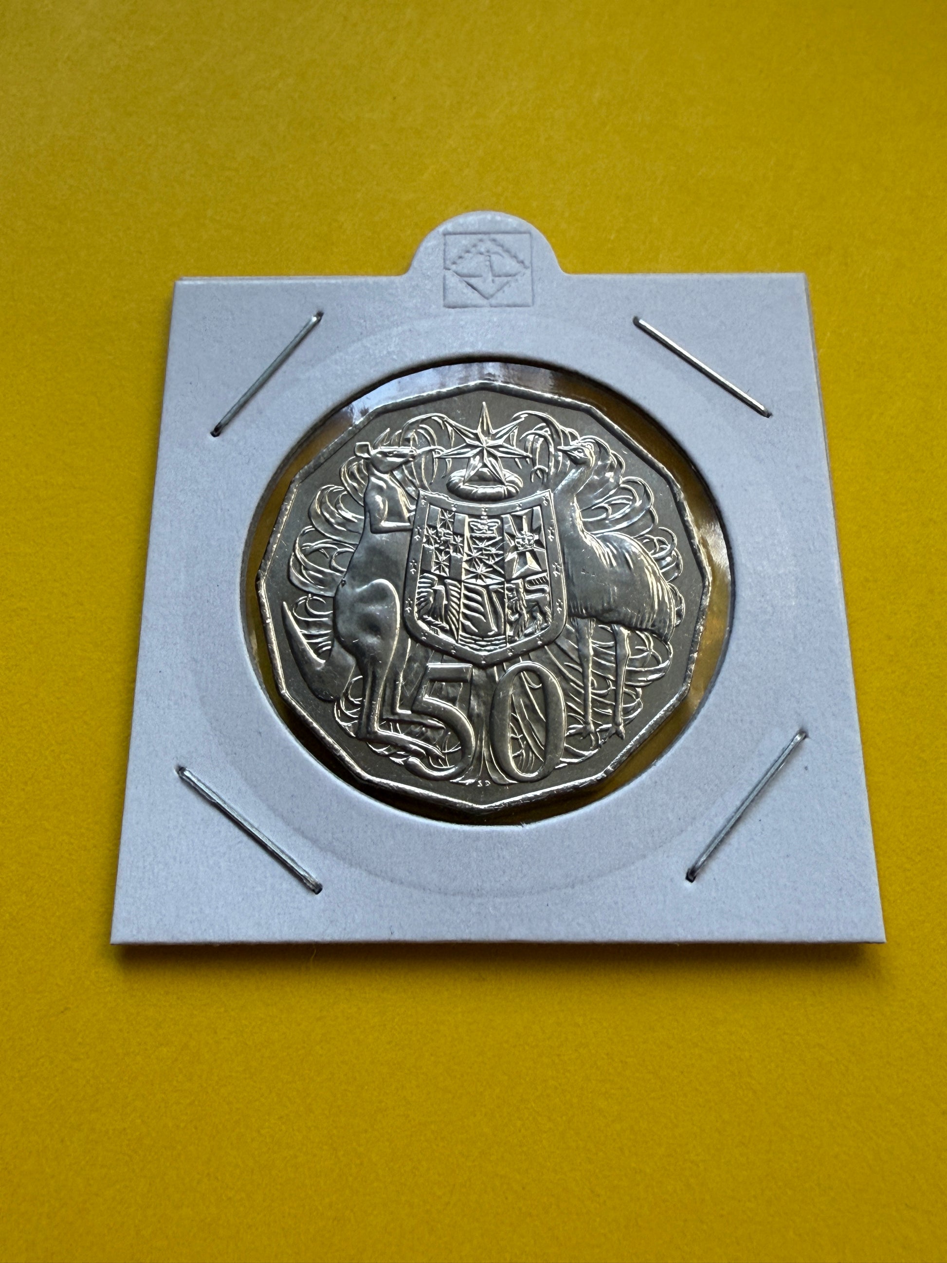 2015 50 Cent Coin - Uncirculated - Coat Of Arms - Comes In 2x2 - New Age Numismatics