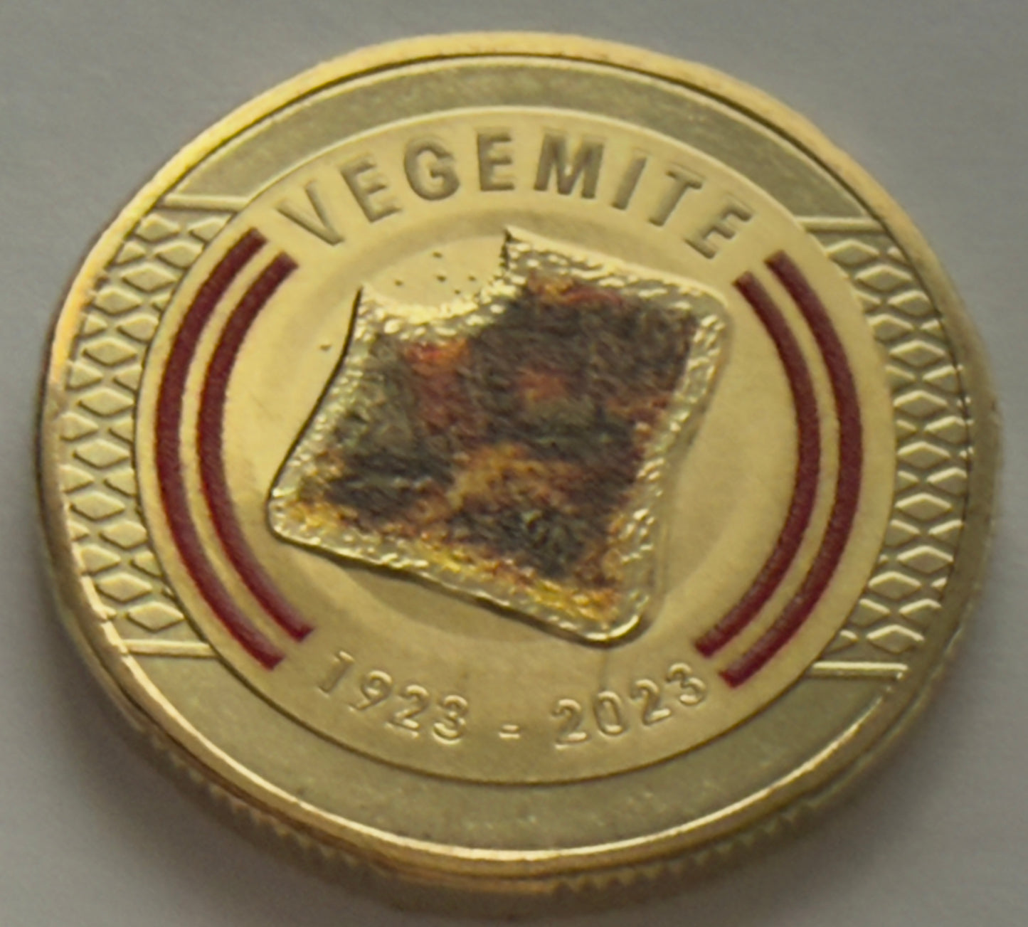 2023 $1 Coin Vegemite - Uncirculated - ex mint set coin - comes in 2x2