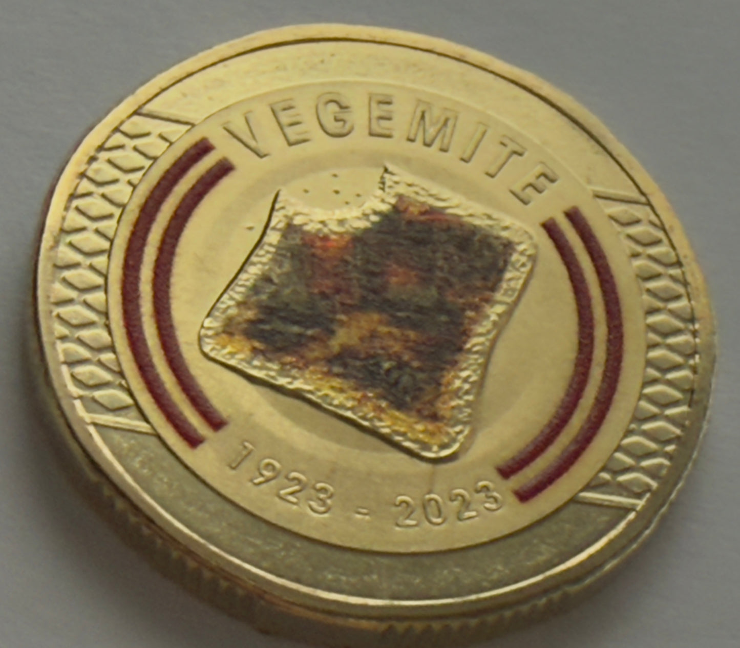 2023 $1 Coin Vegemite - Uncirculated - ex mint set coin - comes in 2x2