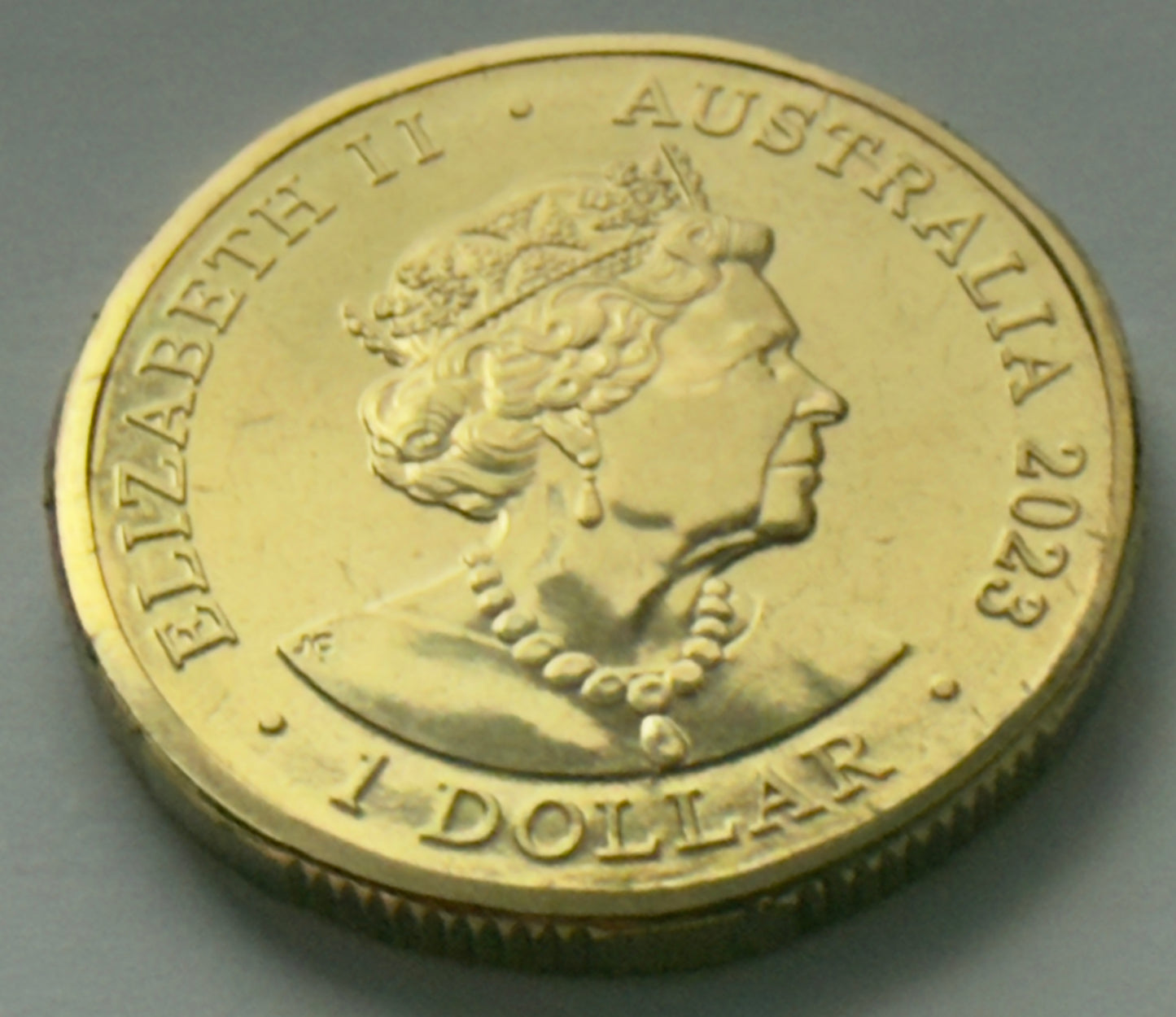 2023 $1 Coin Vegemite - Uncirculated - ex mint set coin - comes in 2x2