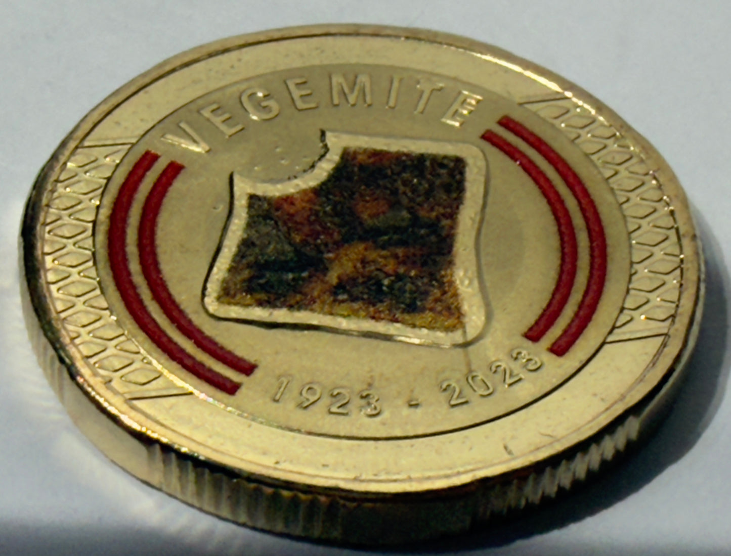 2023 $1 Coin Vegemite - Uncirculated - ex mint set coin - comes in 2x2