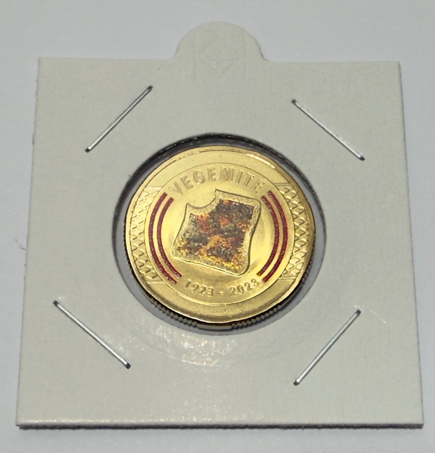 2023 $1 Coin Vegemite - Uncirculated - ex mint set coin - comes in 2x2