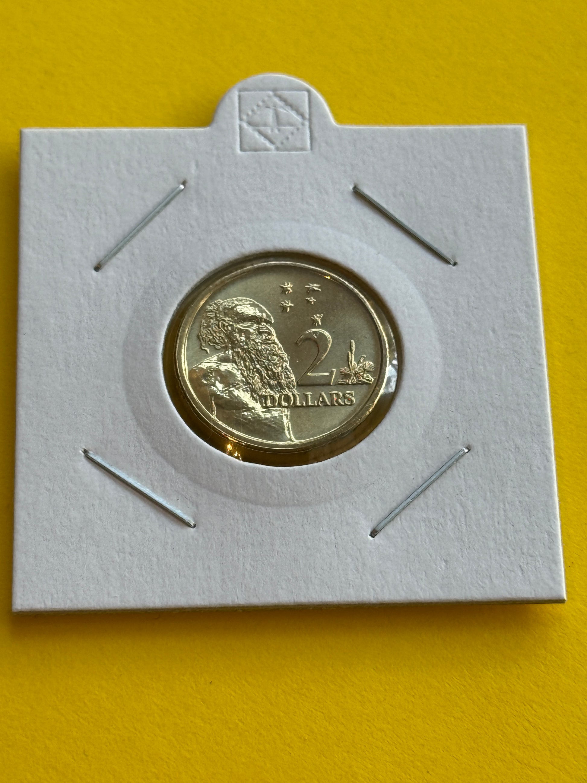 Australian $2 Coin Reverse picturing Gwoya Jungarai (Aboriginal Elder)