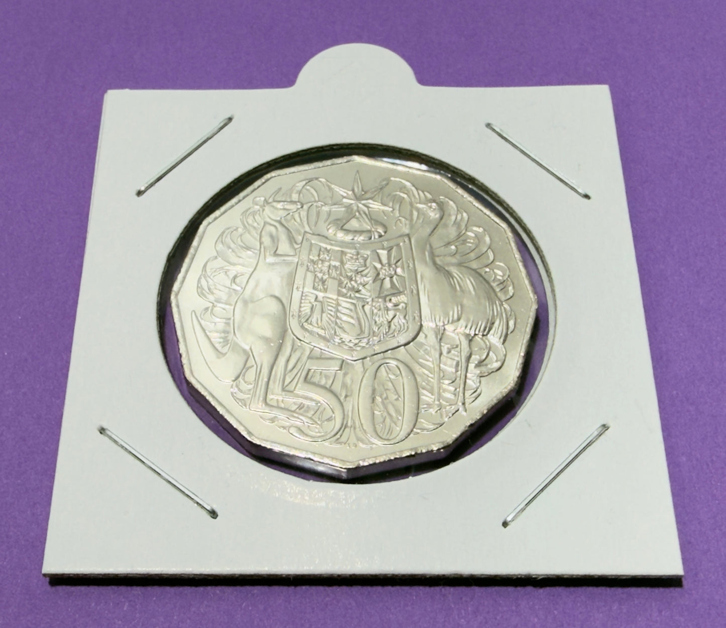 2025 50 Cent Coin - From Premium Roll - with marks/clinks - comes in 2x2