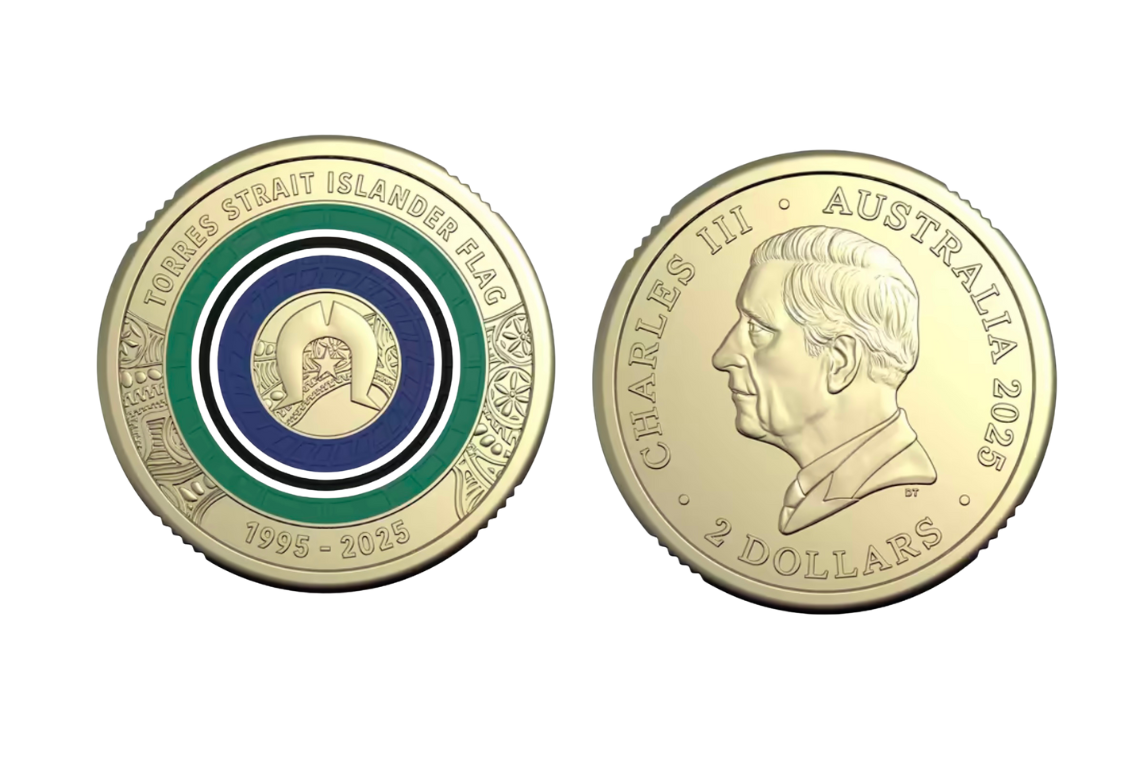 Close-up of 2025 coloured $2 Torres Strait Islander Flag coin showing green, white, black and blue flag design
