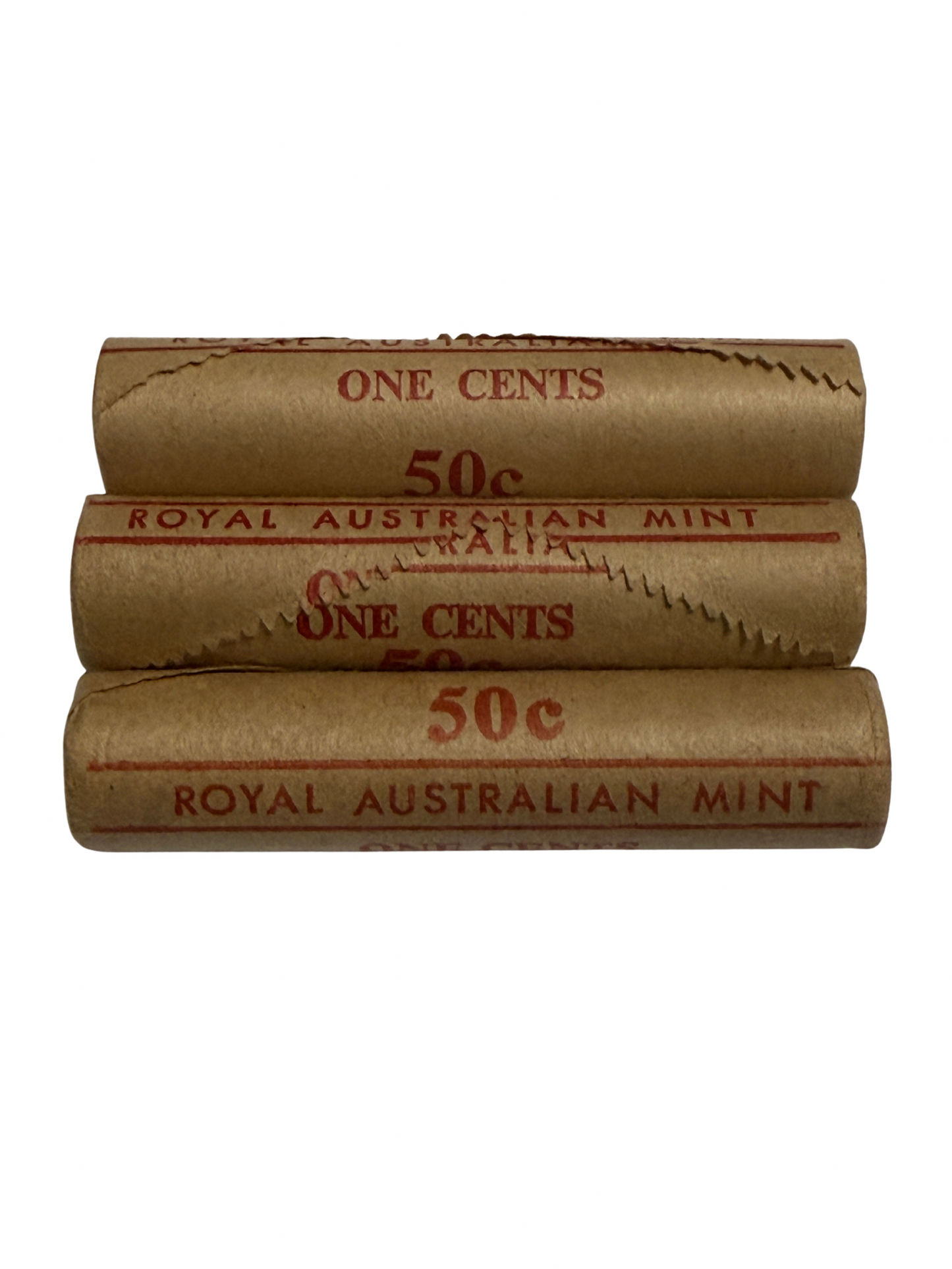 Three rolls of Royal Australian Mint one cent coins on a white background